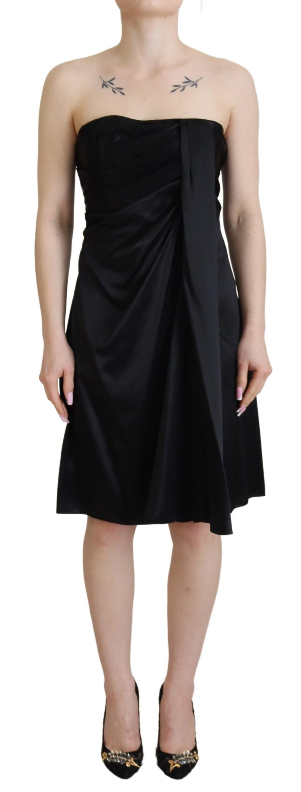 Black silk shift mini dress by Dolce & Gabbana, short party dress with a sleek, elegant silhouette and smooth fabric.