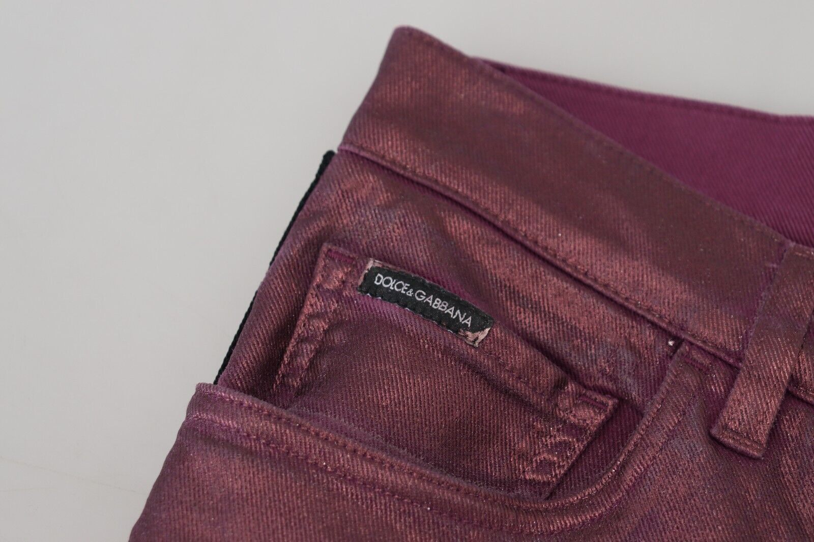 Magenta cotton men's casual harness denim jeans by Dolce & Gabbana, featuring a stylish harness detail and classic denim texture.