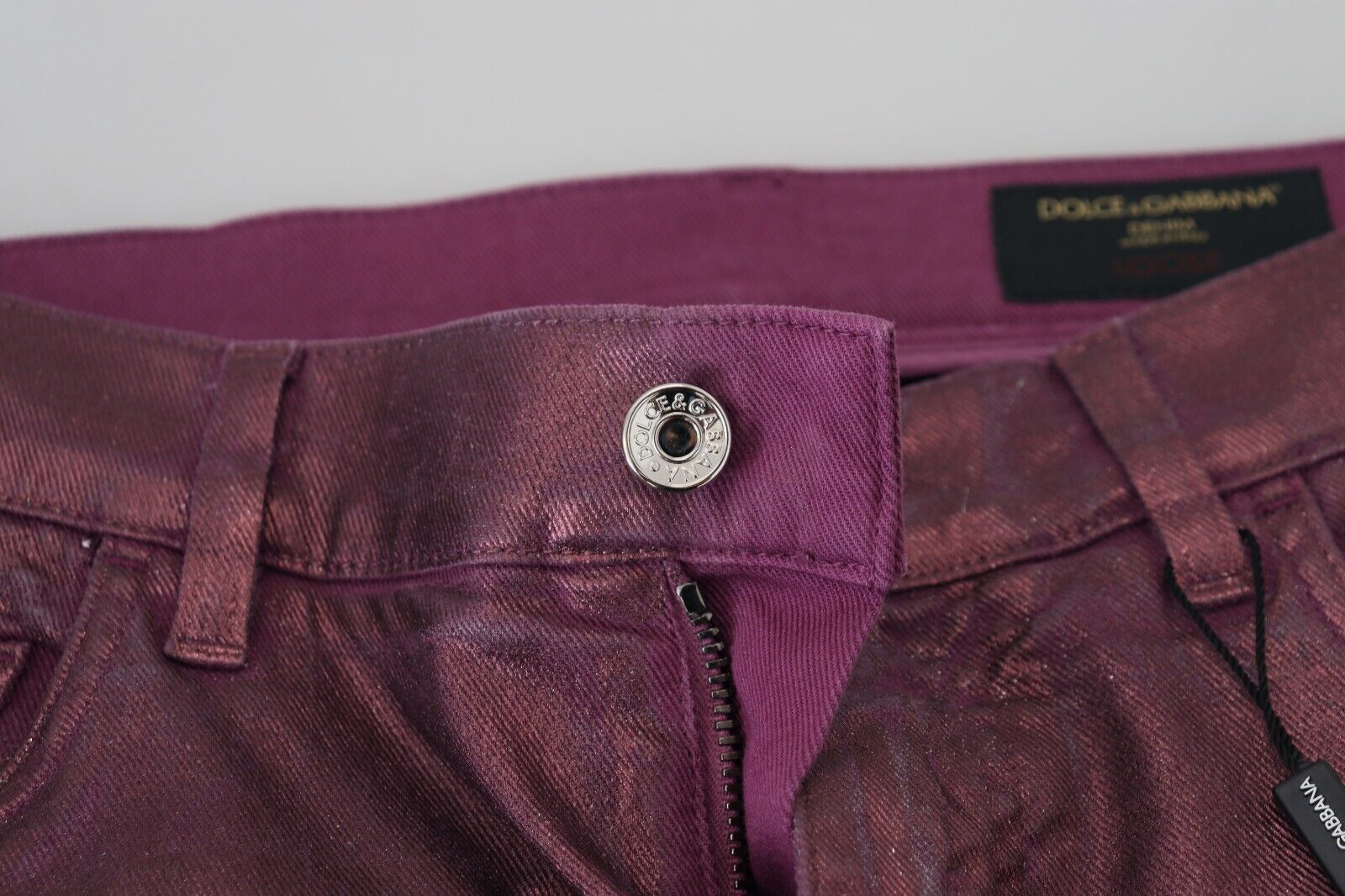 Magenta cotton men's casual harness denim jeans by Dolce & Gabbana, featuring a stylish harness detail and classic denim texture.