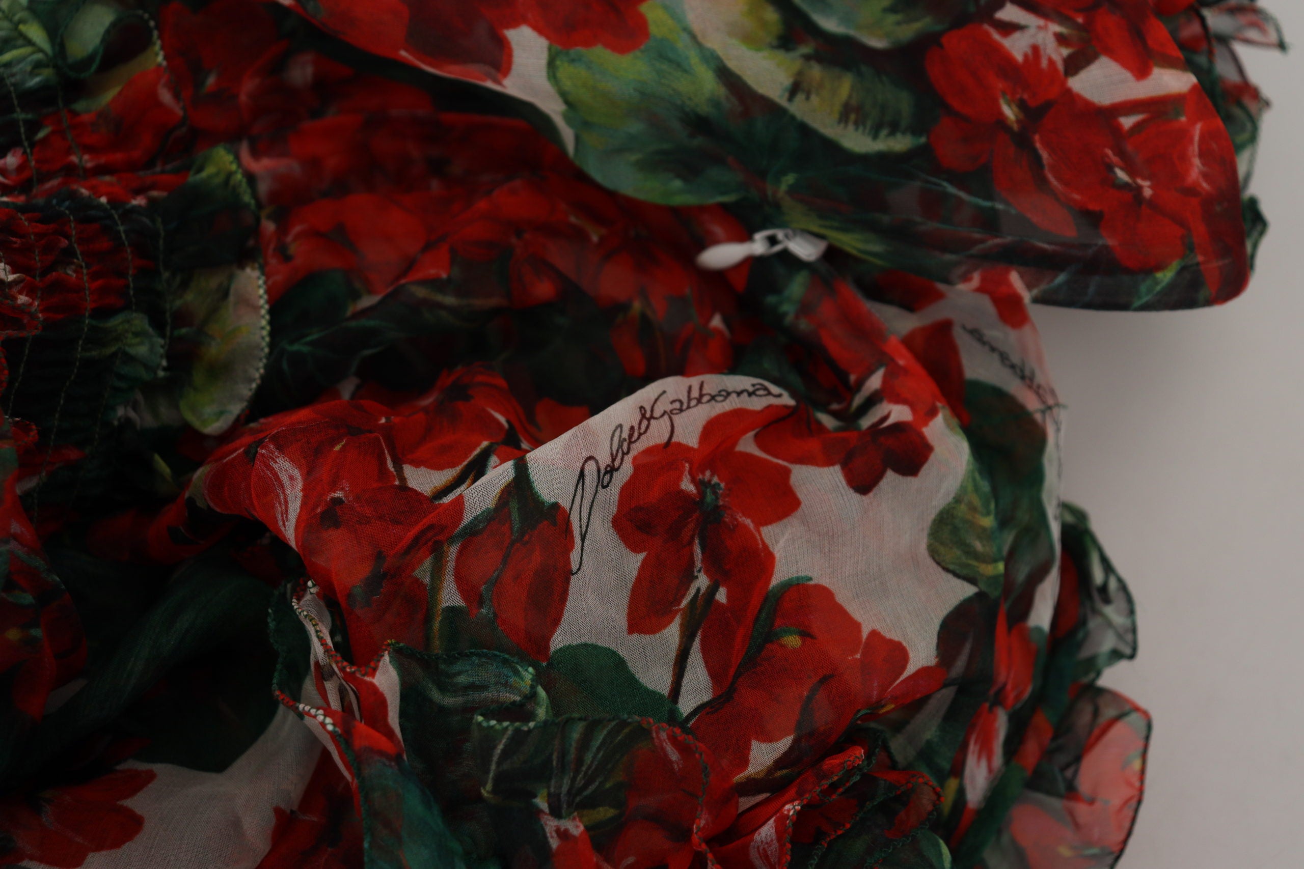 Multicolor Geranium A-line knee-length dress by Dolce & Gabbana, featuring vibrant floral print and elegant fit.