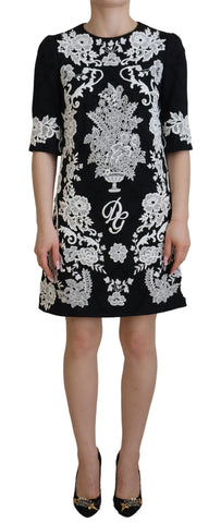 Black lace trim half sleeve A-line dress by Dolce & Gabbana, featuring elegant lace details and a classic silhouette.