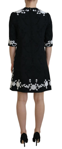 Black lace trim half sleeves A-line dress by Dolce & Gabbana, featuring elegant lace detailing and a classic silhouette.