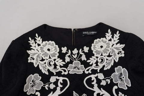 Black lace trim A-line dress with half sleeves by Dolce & Gabbana, featuring elegant lace details and a classic silhouette.