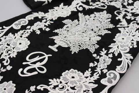 Black lace trim A-line dress with half sleeves by Dolce & Gabbana, featuring elegant lace details and a flattering silhouette.
