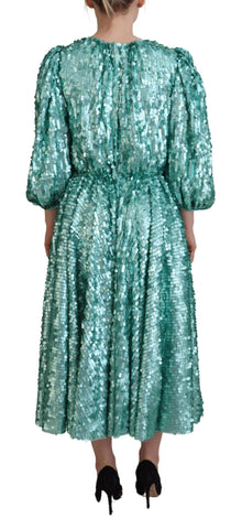 Blue sequined pleated A-line midi nylon dress by Dolce & Gabbana, featuring shimmering fabric and elegant midi length.