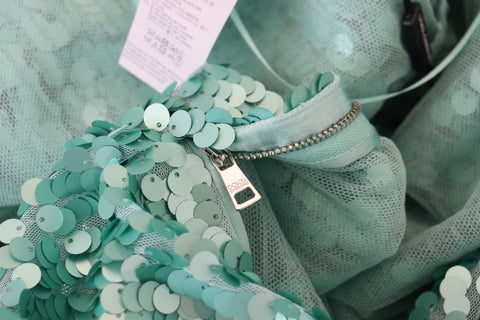 Blue sequined pleated A-line midi nylon dress by Dolce & Gabbana, featuring shimmering sequins and elegant pleats.