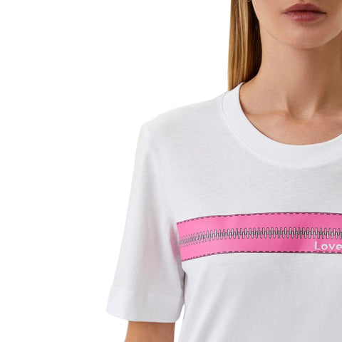 Close-up of the Moschino X073_W4F154C-M3876_A00 logo on a fashion item, featuring bold branding and detailed stitching.