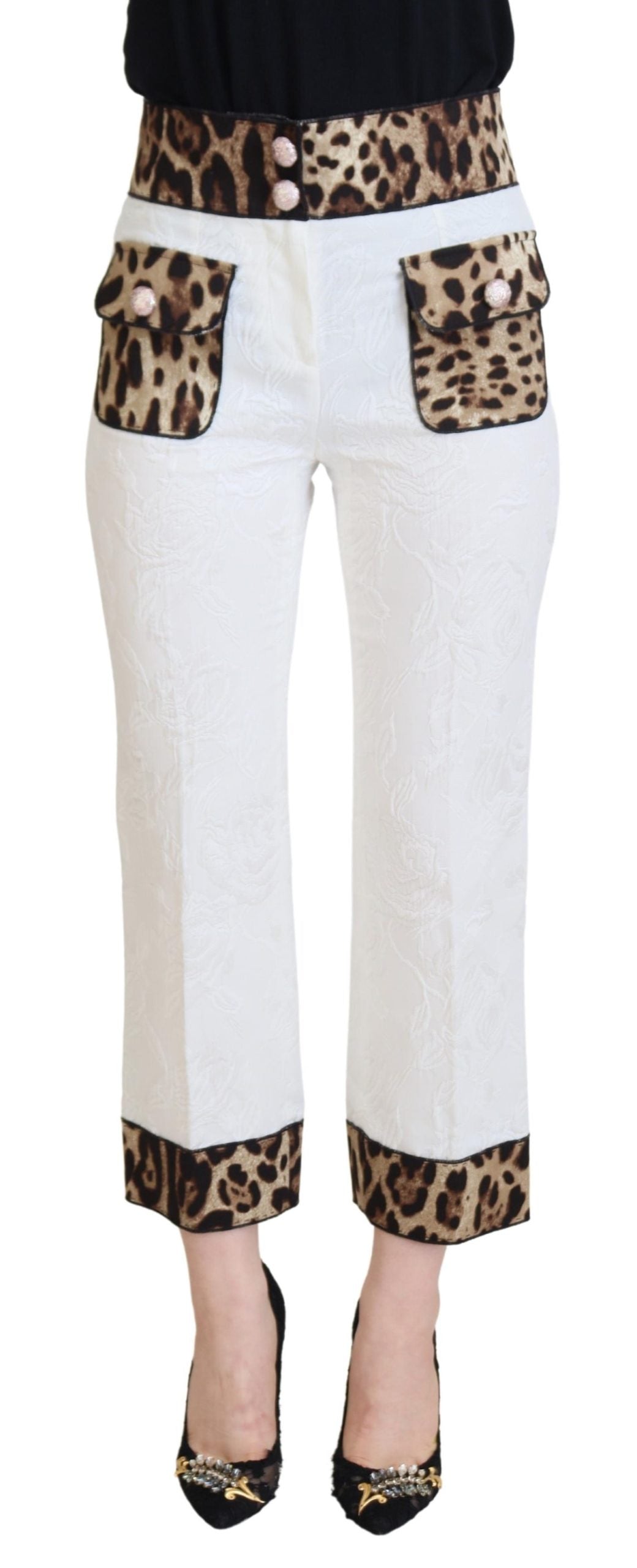 White leopard print high waist pants by Dolce & Gabbana, showcasing fitted design and stylish animal pattern.