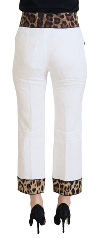 White leopard print high waist pants by Dolce & Gabbana, showcasing the stylish pattern and tailored fit.