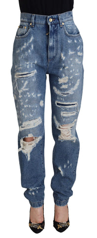 Blue washed cotton tattered denim jeans by Dolce & Gabbana, showcasing distressed details and classic five-pocket style.