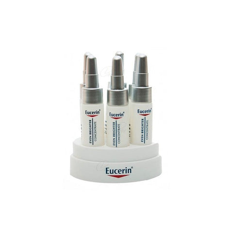 Eucerin Even Brighter Concentrado 6 Ampollas reducing dark spots with B-Resorcinol, shown in a sleek skincare container.