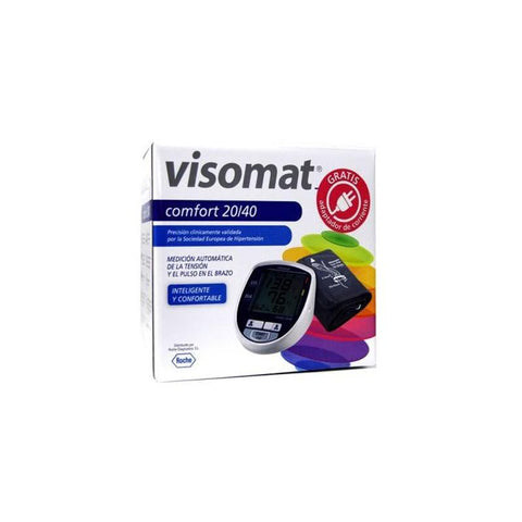 Roche Diagnostic Visomat Comfort blood pressure monitor with power adapter, shown on a white background.