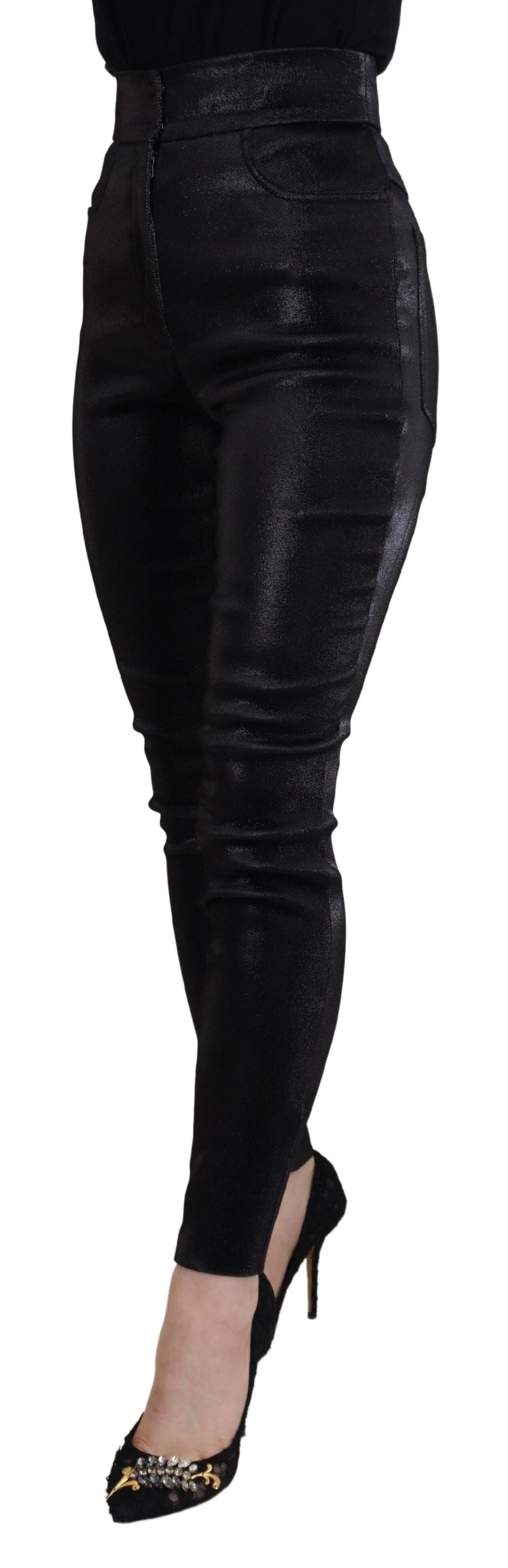 Black washed cotton skinny denim jeans by Dolce & Gabbana, shown folded with visible stitching and classic five-pocket design.