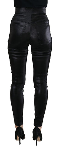 Black washed cotton skinny denim jeans by Dolce & Gabbana, showing fitted style with subtle fading and classic five-pocket design.