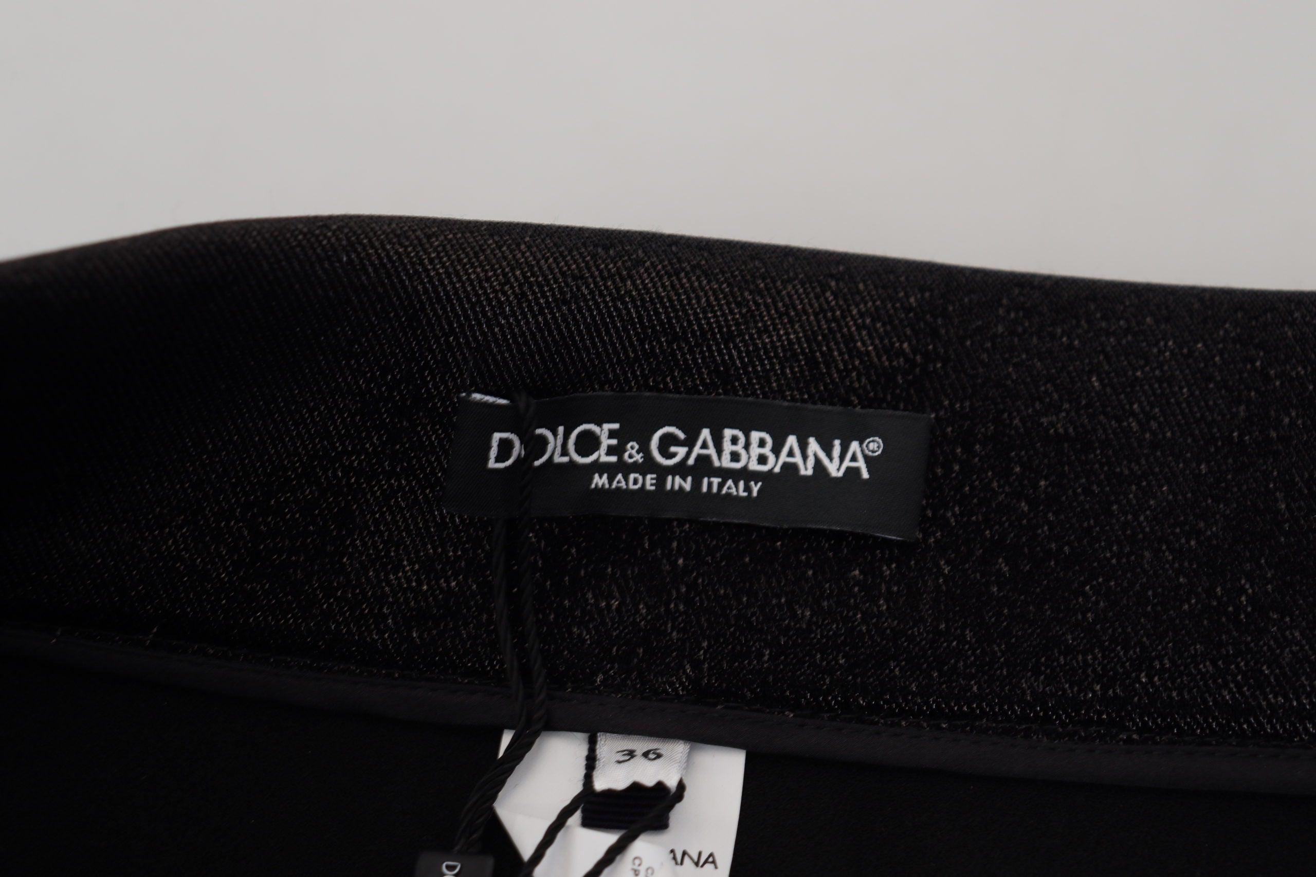 Black washed cotton skinny denim jeans by Dolce & Gabbana, showing the fitted style and classic five-pocket design.
