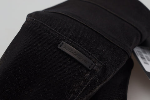 Black washed cotton skinny denim jeans by Dolce & Gabbana, showing fitted style and classic five-pocket design.