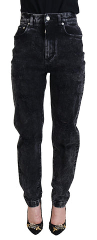 Black washed cotton high-waist denim jeans by Dolce & Gabbana, shown with a focus on the fit and fabric texture.