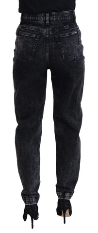 Black washed cotton high-waist denim jeans by Dolce & Gabbana, showing the fitted style and classic five-pocket design.