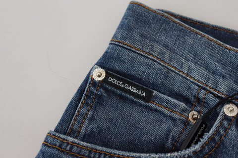 Blue checkered back skinny denim jeans by Dolce & Gabbana, showing the fitted style and checkered back pocket detail.
