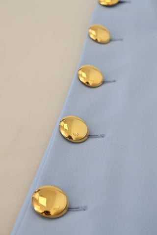 Light blue Dolce & Gabbana button wide-leg pants with high waist and relaxed fit, shown on a model.