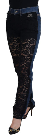 Black floral lace front skinny denim jeans by Dolce & Gabbana, showcasing lace details and a slim fit style.