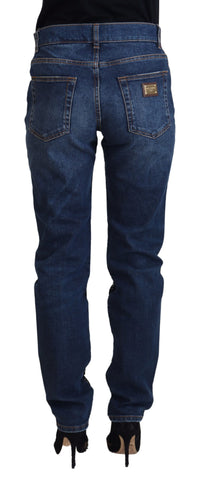 Black floral lace front skinny denim jeans by Dolce & Gabbana, featuring floral lace detail and a slim fit design.
