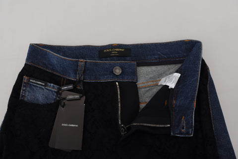 Black floral lace front skinny denim jeans by Dolce & Gabbana, featuring floral lace details and a fitted denim silhouette.