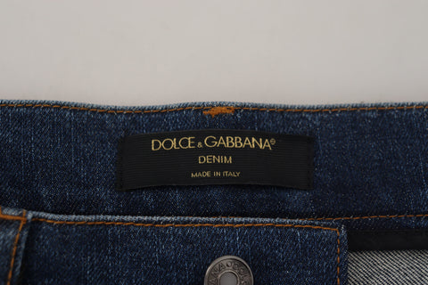 Black floral lace front skinny denim jeans by Dolce & Gabbana, showcasing lace details and a fitted denim silhouette.