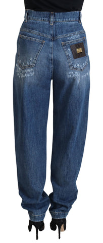 Blue washed cotton tattered denim jeans by Dolce & Gabbana, showing distressed details and classic five-pocket style.
