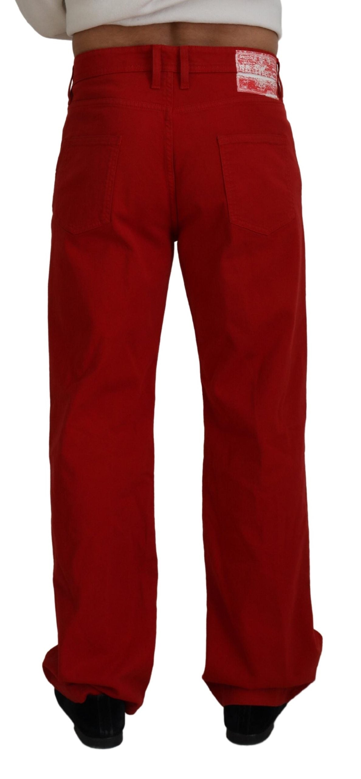 Red cotton straight fit men's denim jeans by Dolce & Gabbana, shown hanging with front and back views.