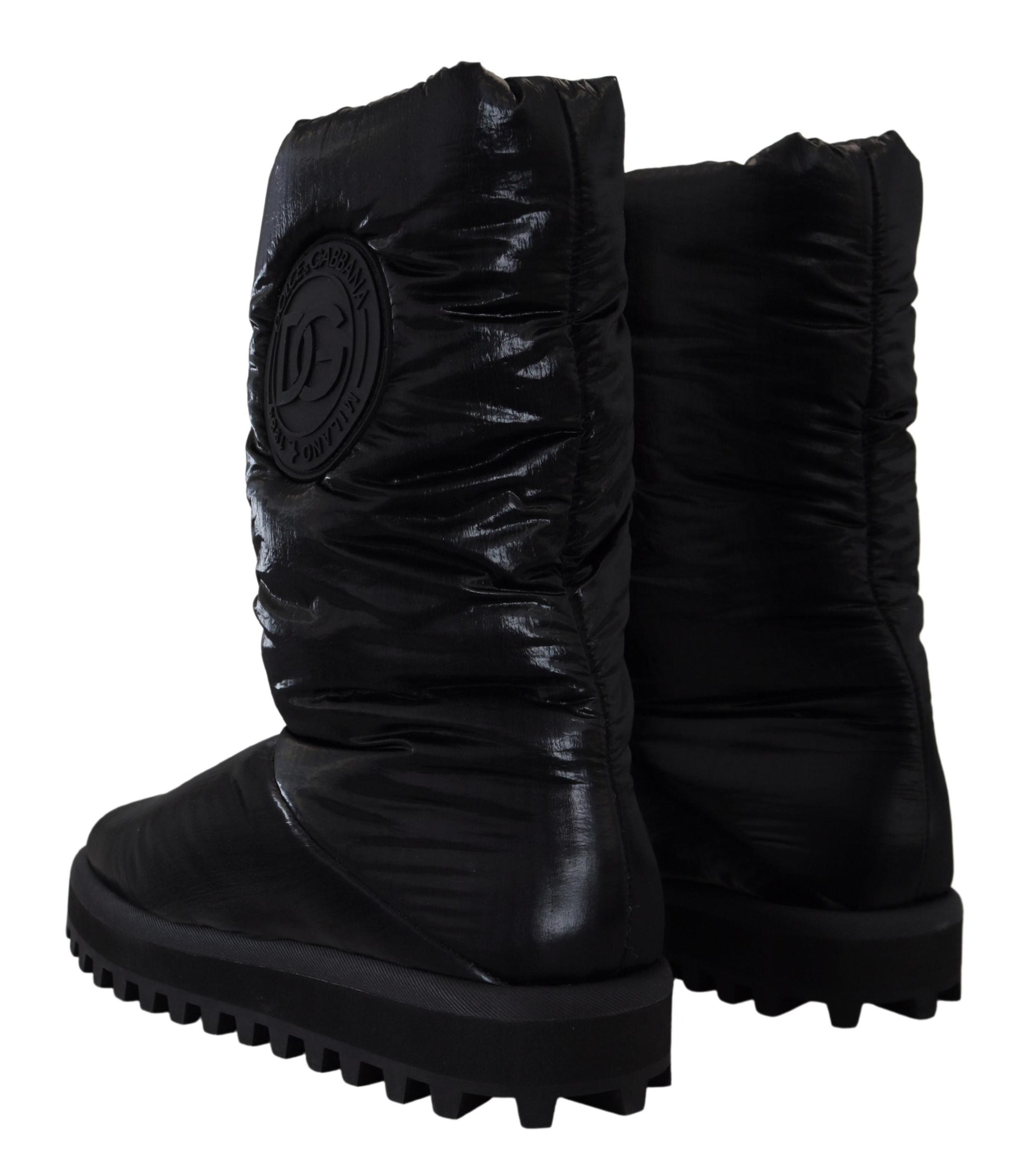 Dolce & Gabbana black padded mid-calf winter boots with sturdy soles and stylish design, ideal for cold weather.
