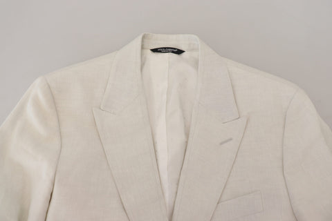 White linen slim fit blazer jacket by Dolce & Gabbana, tailored with a sleek design and classic lapel for a sophisticated look.