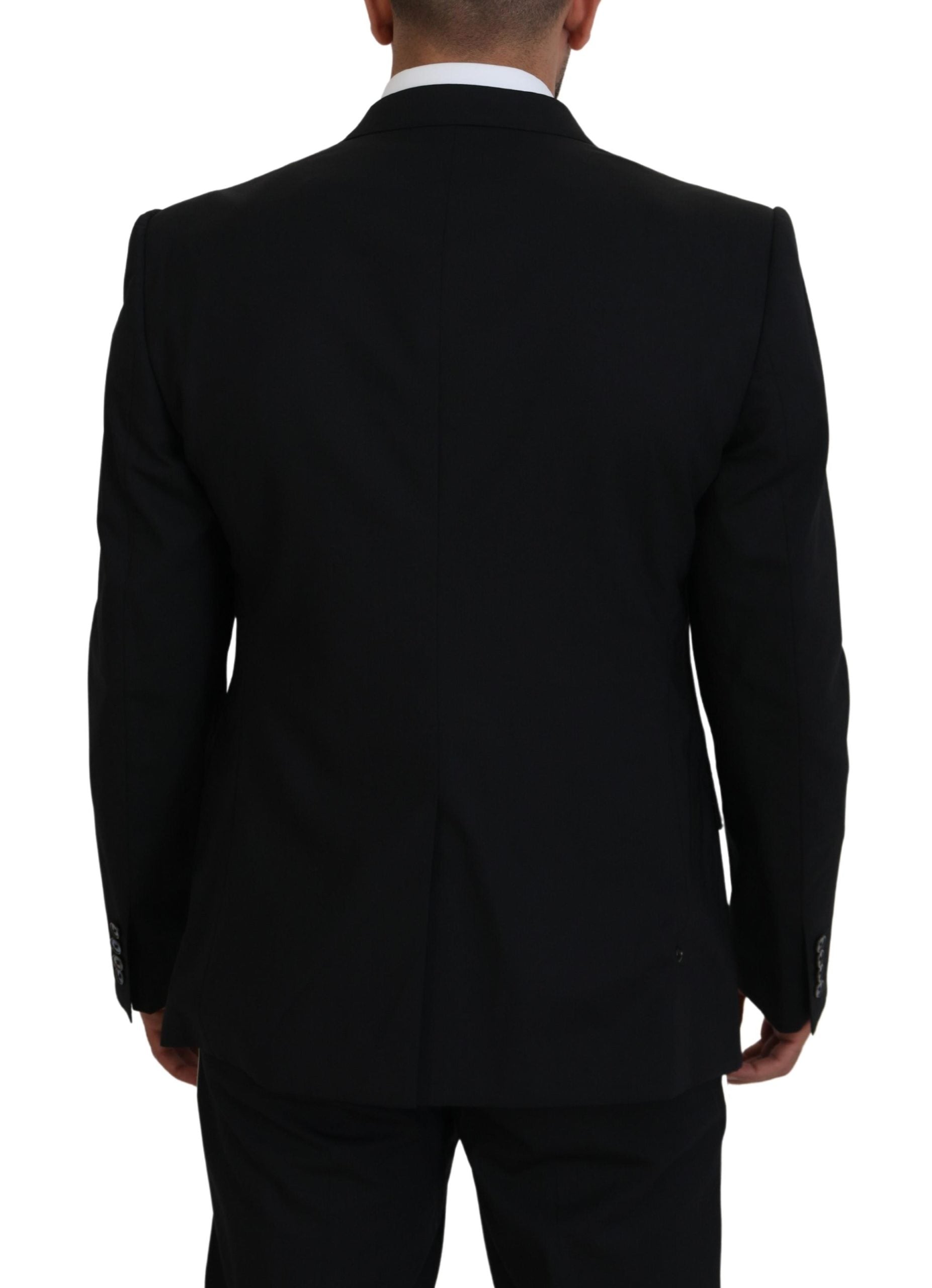 Black wool stretch slim fit blazer jacket by Dolce & Gabbana, shown on a hanger with a tailored fit and classic lapel.