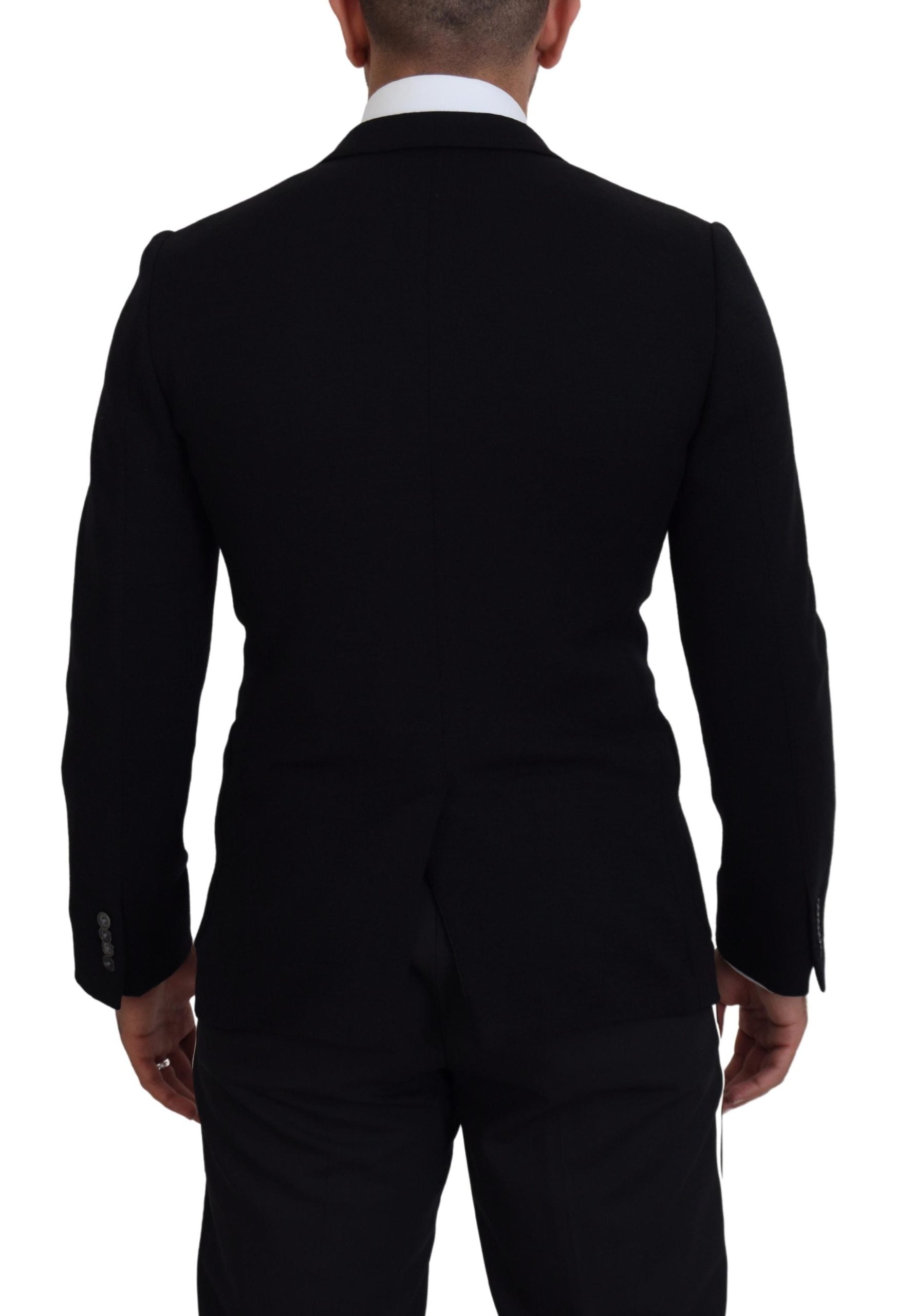 Black wool blazer jacket with slim fit design from Dolce & Gabbana, featuring a tailored collar and sleek, modern style.