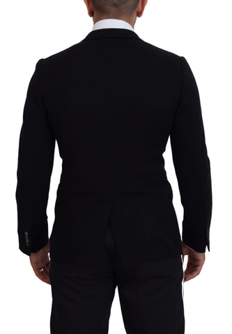 Black wool blazer jacket with slim fit design from Dolce & Gabbana, featuring a tailored collar and sleek, modern style.