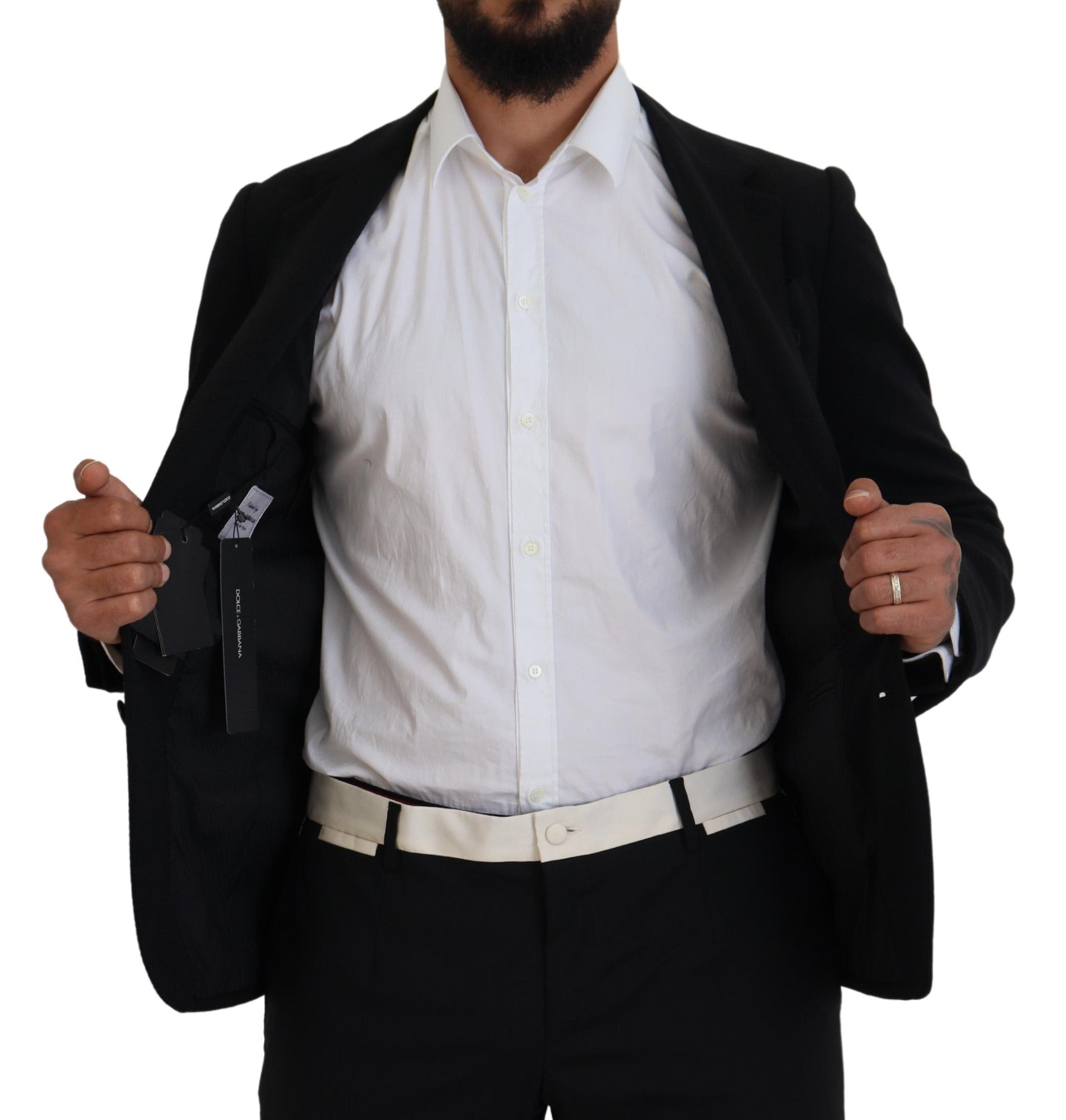 Black wool blazer jacket by Dolce & Gabbana, slim fit design with a tailored crown collar, perfect for formal or stylish occasions.
