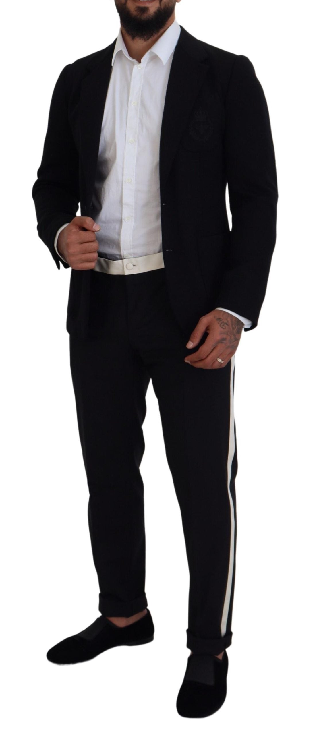 Black wool blazer jacket with a slim fit and crown detail from Dolce & Gabbana, tailored for a sleek, stylish look.