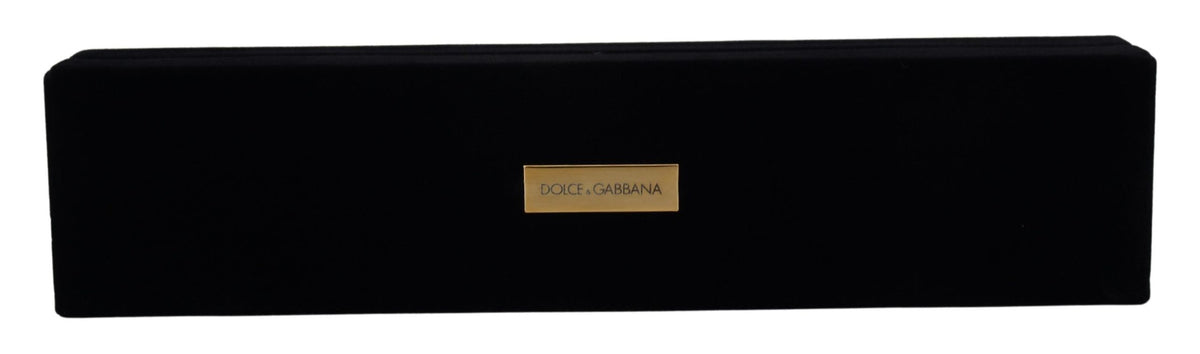 Black velvet jewelry box with Dolce & Gabbana logo plaque, designed for storing bracelets and delicate jewelry pieces.