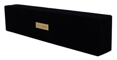 Black velvet jewelry box with Dolce & Gabbana logo plaque, designed for storing bracelets and jewelry securely.