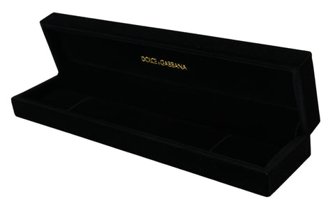 Black velvet Dolce & Gabbana jewelry box with logo plaque for storing bracelets and jewelry, featuring a sleek, elegant design.
