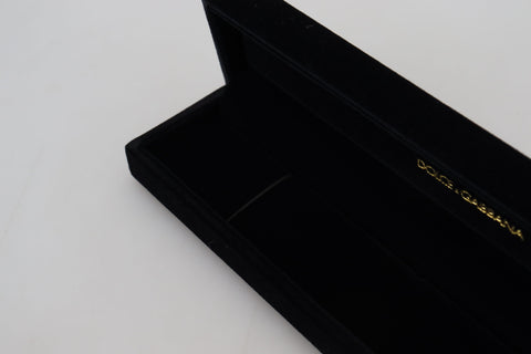 Black velvet jewelry box with Dolce & Gabbana logo plaque, designed for storing bracelets and jewelry securely.