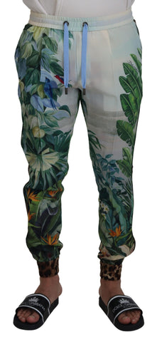 White floral printed men's jogger pants by Dolce & Gabbana featuring a relaxed fit and floral design on soft fabric.