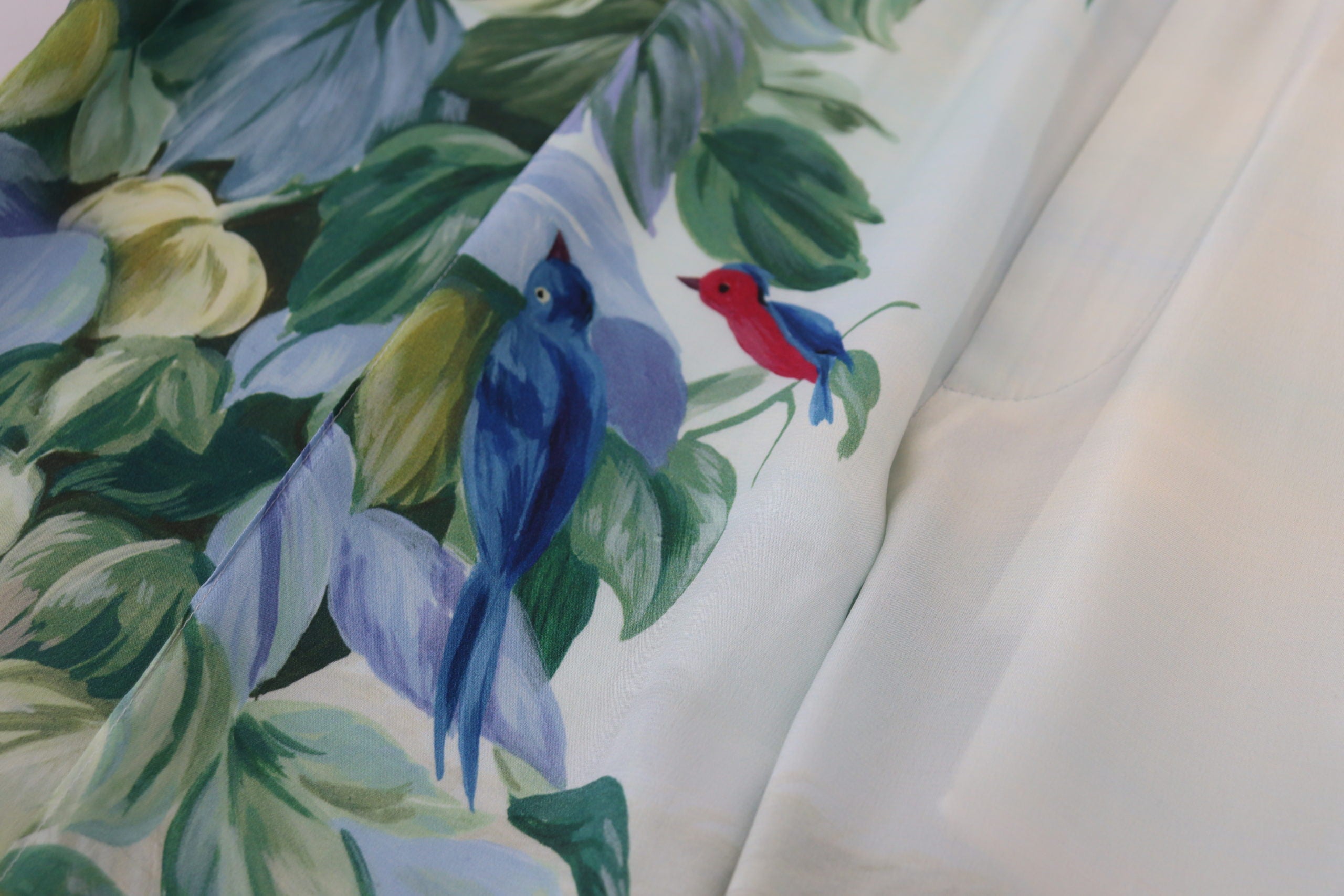 White floral printed Dolce & Gabbana men's jogger pants with an elastic waistband and relaxed fit.