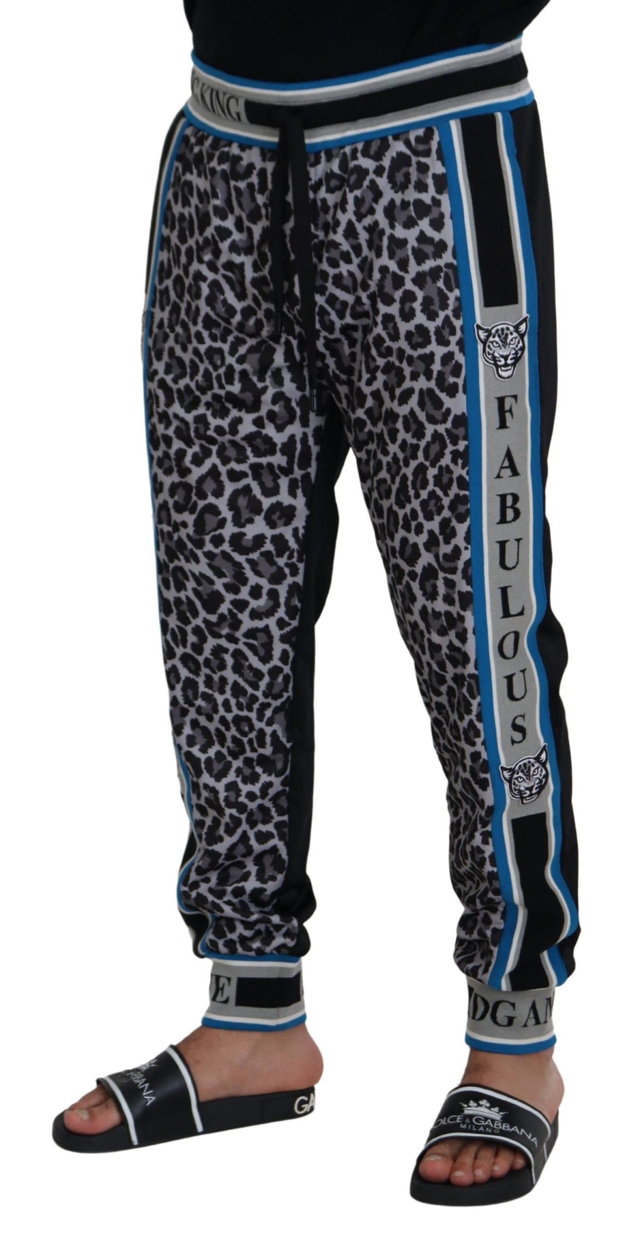 Multicolor DG King leopard print jogger pants by Dolce & Gabbana with elastic waistband and tapered fit, shown on a model.