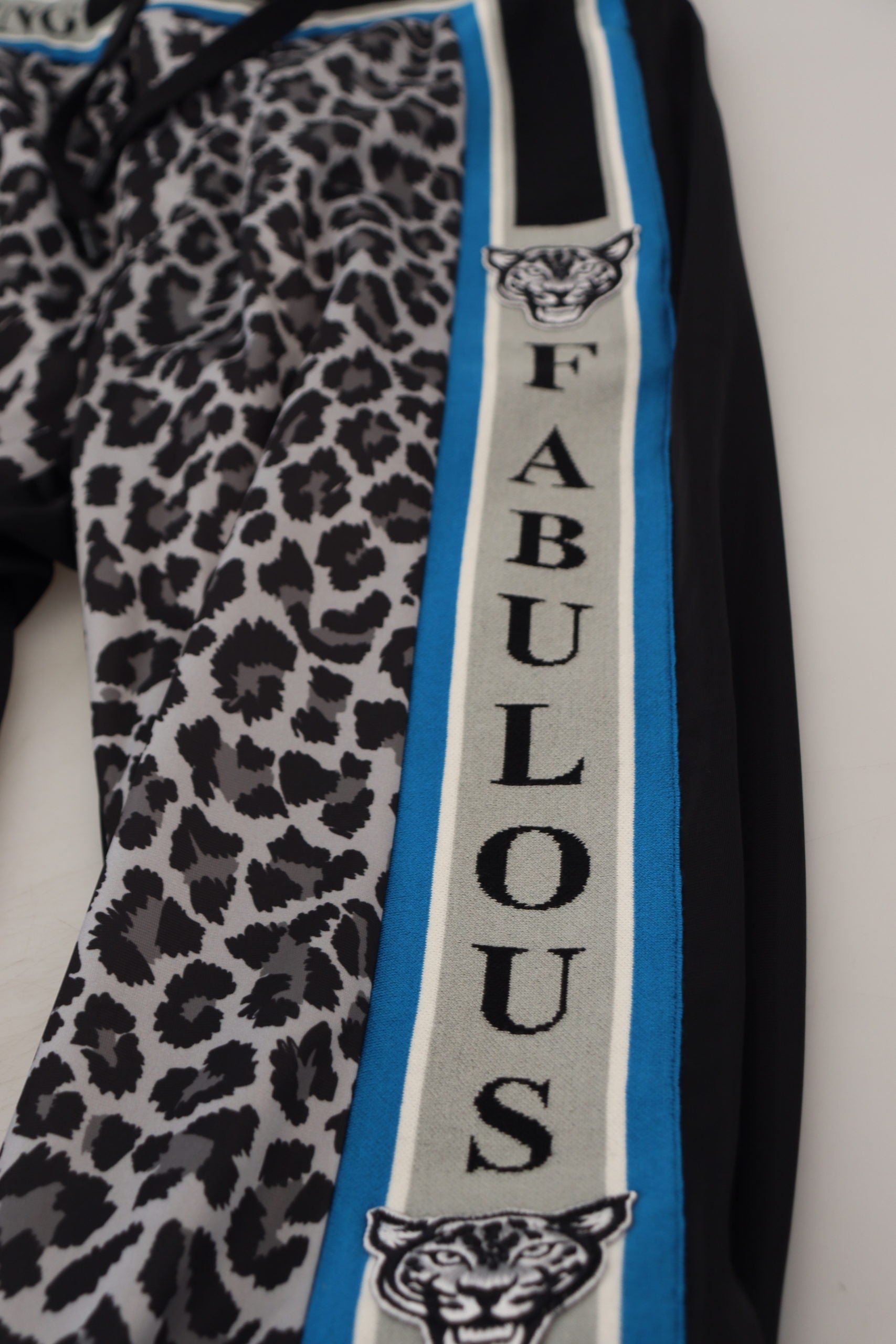 Multicolor DG King leopard print jogger pants by Dolce & Gabbana showing the vibrant, patterned fabric and relaxed fit.