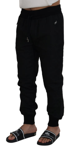 Black men's casual jogger pants by Dolce & Gabbana, featuring a relaxed fit with elastic waistband and tapered cuffs.
