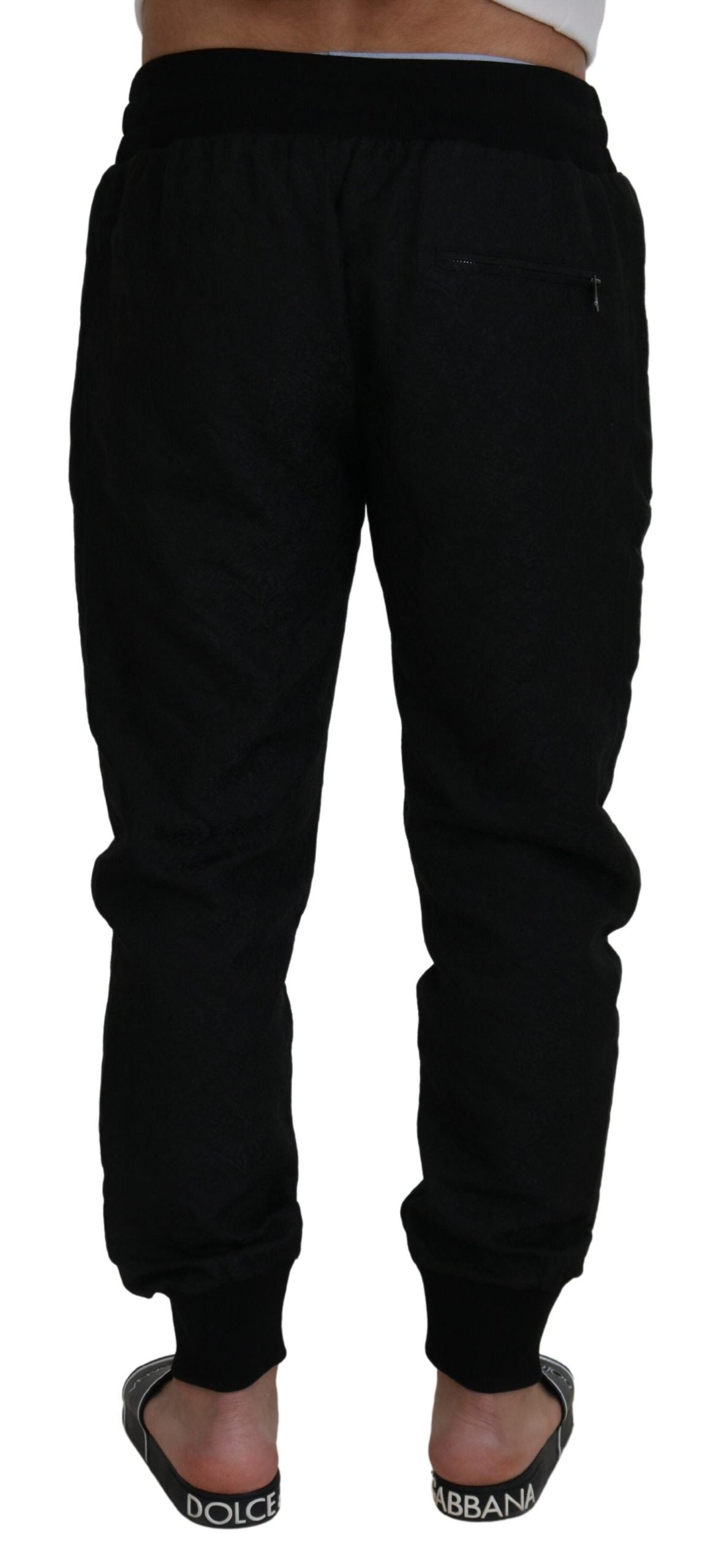 Black men's casual jogger pants by Dolce & Gabbana, featuring a relaxed fit and elastic waistband.