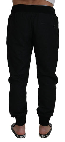 Black men's casual jogger pants by Dolce & Gabbana, featuring a relaxed fit and elastic waistband.