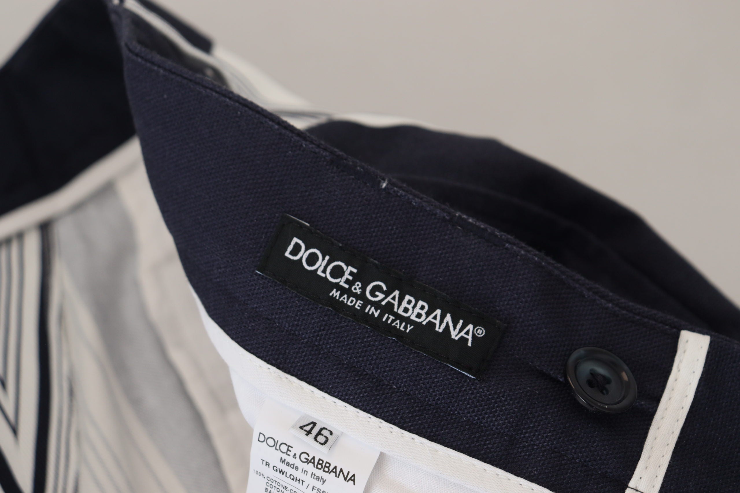 White cotton striped cropped pants by Dolce & Gabbana, featuring a fitted waist and casual, stylish design.