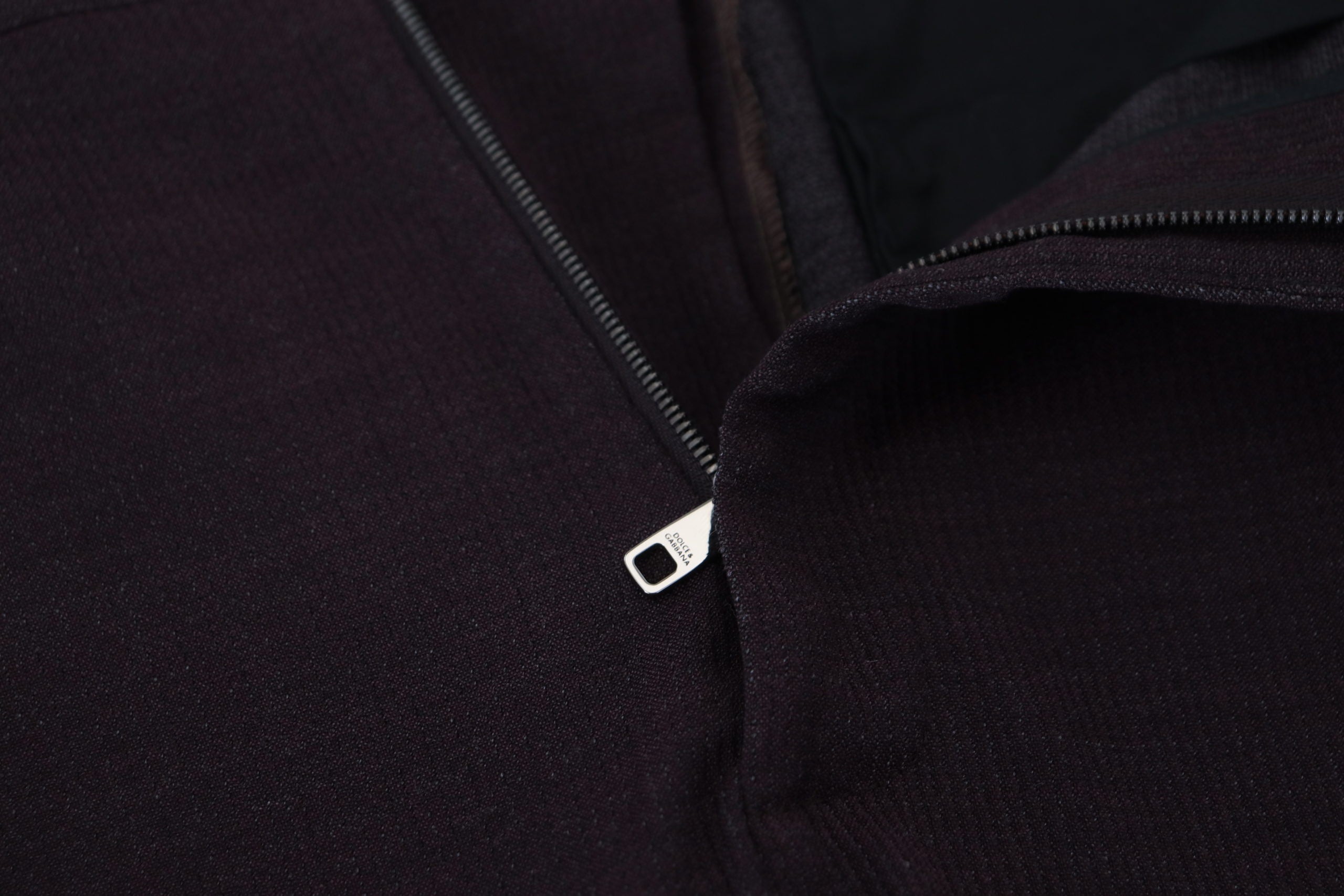 Men's brown cotton chino pants by Dolce & Gabbana, shown on a model with a classic fit and smooth fabric texture.